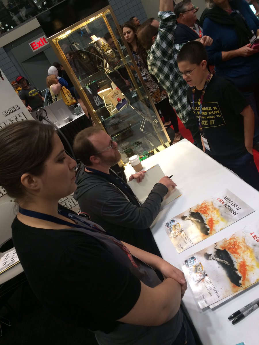StarWarsByRHW's tweet photo. Now signing until noon, author @ChuckWendig #Booth2108 Free #EmpiresEnd poster #StarWars #Aftermath #NYCC2016 https://t.co/U9AkihV9ij