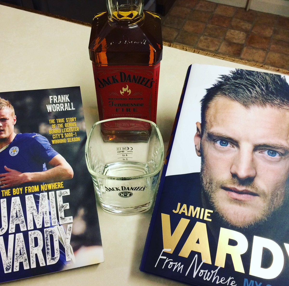 Lee_Chappy's tweet photo. @JackDanielsUK @frankworrall My Saturday Night plan, which is the better read though? #Vardy #mystory #FromNowhere #LCFC #Champions #JDFire https://t.co/iOhUyH6i92