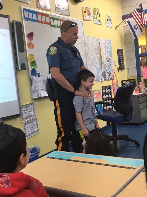 VoorheesPolice's tweet photo. PO Belli at an #AdoptaCop Lesson at @KellmanBrown during #NationalCommunityPolicingWeek, this program runs all school year 4 all 3rd grades. https://t.co/BVKzUxkANS