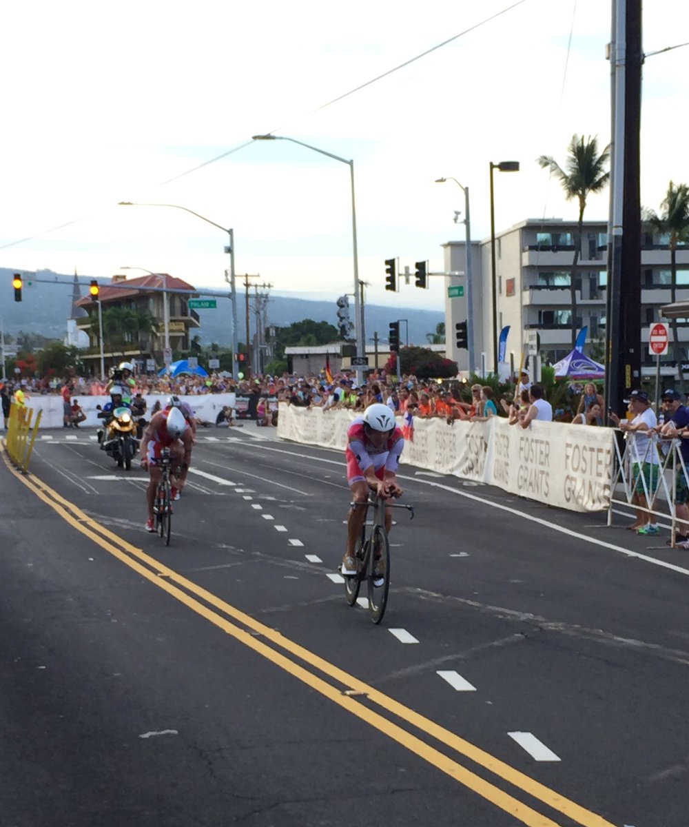 LavaMagazine's tweet photo. Jan Frodeno leading onto the bike with a huge pack on his tail. #IMMona is off to an exciting start! https://t.co/uHddGIWQAD