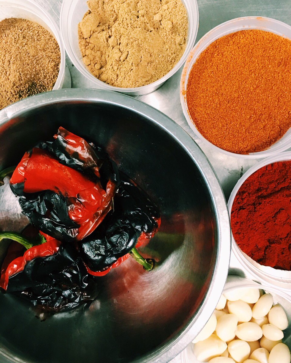 ChefEinat's tweet photo. Look at how colorful all the ingredients are for harissa! A closeup of preparing dishes for the @CityHarvest #BidAgainstHunger event 🌈 https://t.co/lVb2Of1Hwq