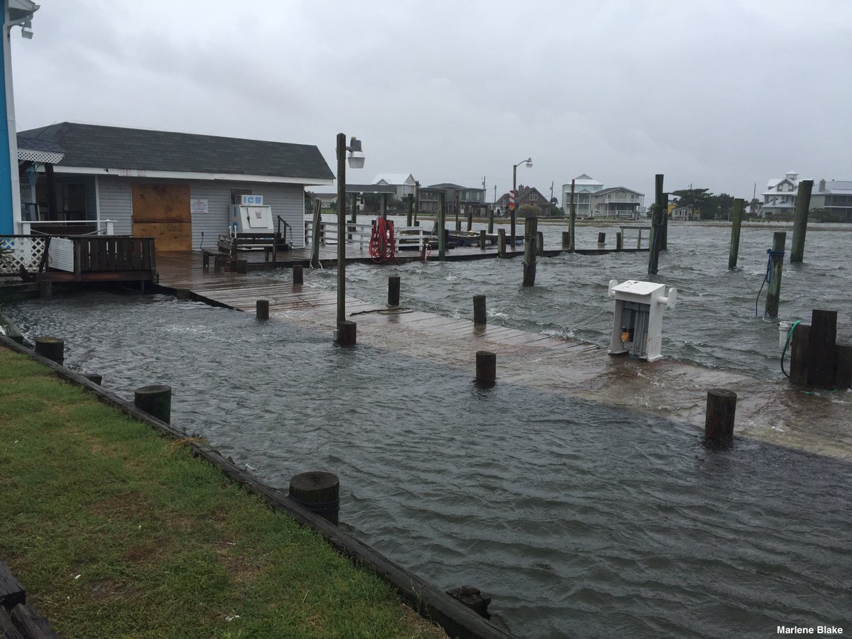 Photos show storm surge from Hurricane Matthew reaching parking lot