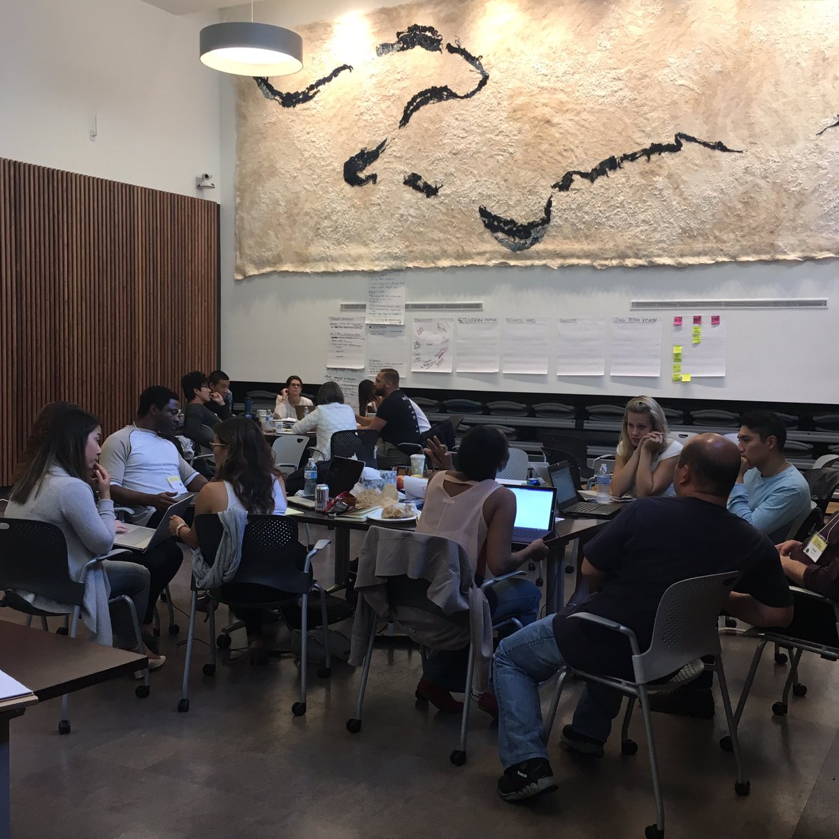 Everyone's working hard here <a href="/swoakland/">Startup Weekend OAK</a>! #hackingbias #StartupWeekend