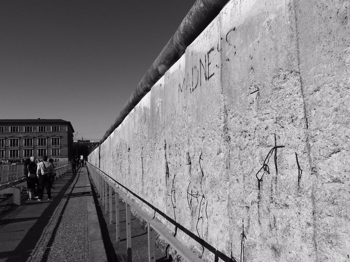 woodymadness's tweet photo. In 1980 @suggsgmcpherson climbed on top of a van and wrote MADNESS on the Berlin Wall. Here it is today. https://t.co/usdXaKxf4o
