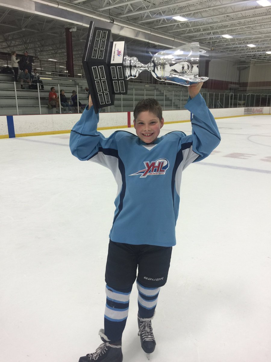 This is my son with the YHL cup. <a href="/JonathanToews/">Jonathan Toews</a> <a href="/CanadianTire/">Canadian Tire</a> #CTFirstShift