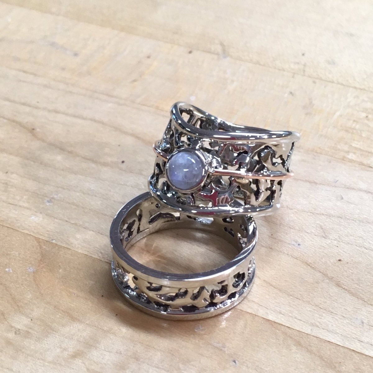 kimkropf's tweet photo. These beauties went home to happy clients yesterday. 14k white gold, rose gold accents, moonstone. Hand pierced design #thestudiokw https://t.co/X0vopf64q4