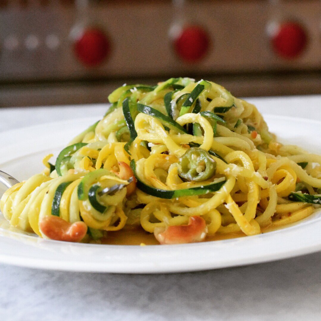 GlobalVegTweets's tweet photo. Zoodles sautéed in coconut oil w/whole mustard seeds,cashews,serranos &amp; grated coconut. #vegan #glutenfree https://t.co/ZHUg4XlwBH