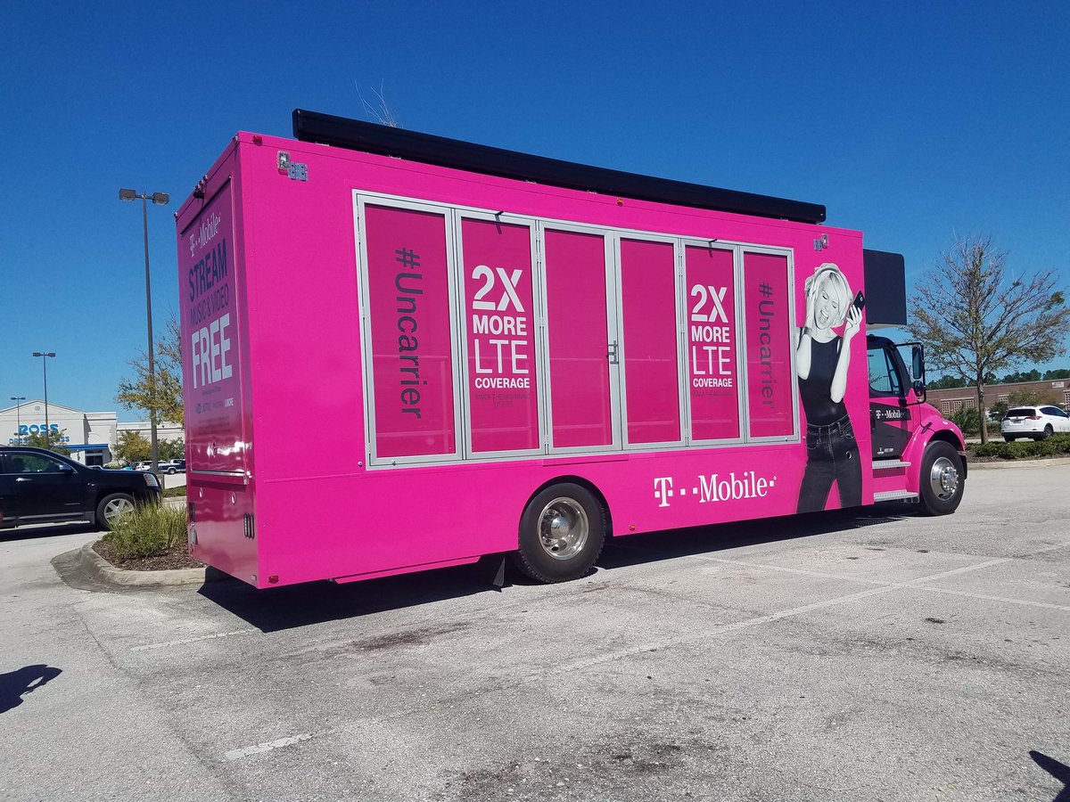 caseybwright's tweet photo. Store can't open because of the hurricane? We'll bring a truck! We've got water and chargers. Representing that magenta pride! @JohnLegere https://t.co/lYnHpaclWF