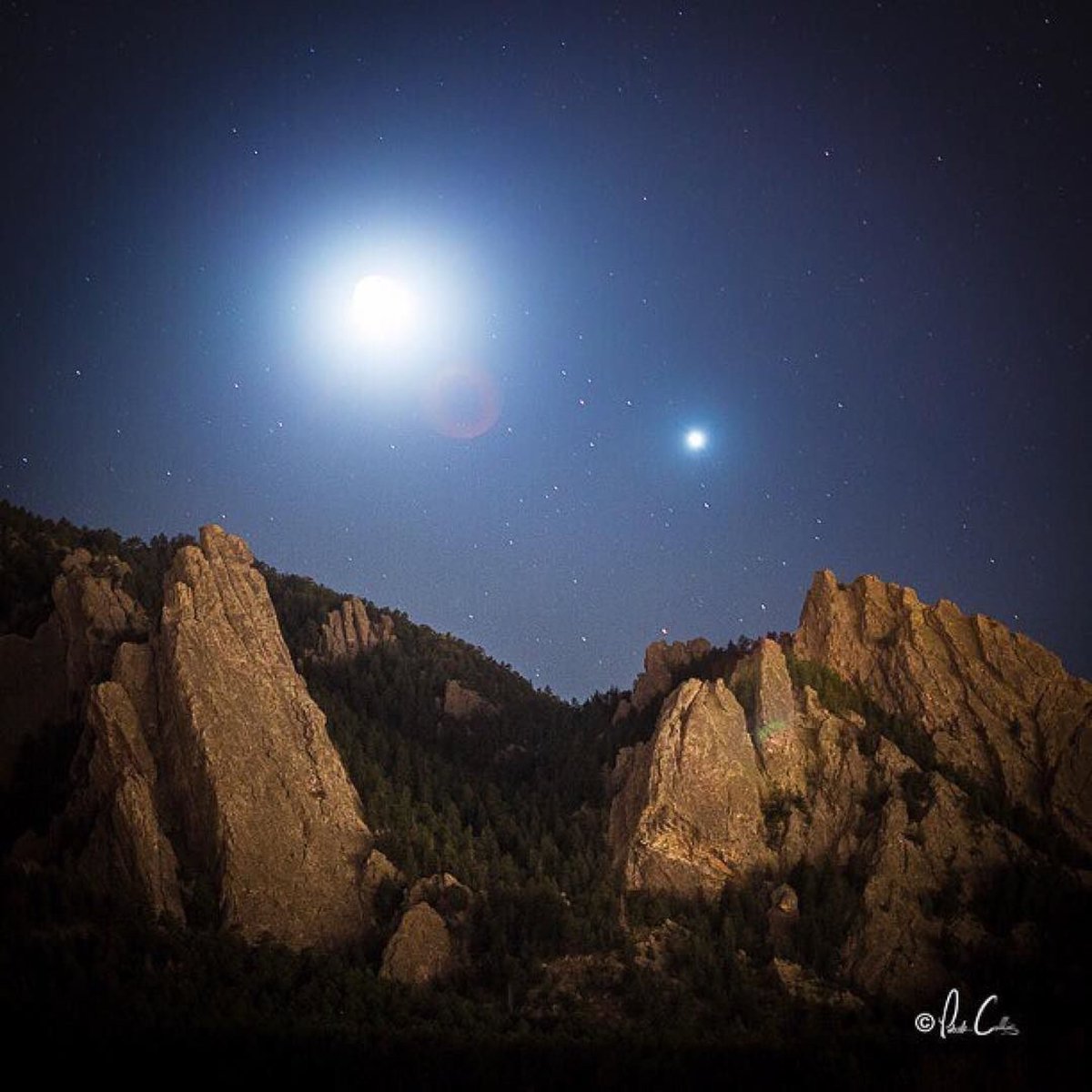 Venus joins a crescent moon in the sky above #Boulder in 2012. Photo by pcullis via Instagram.