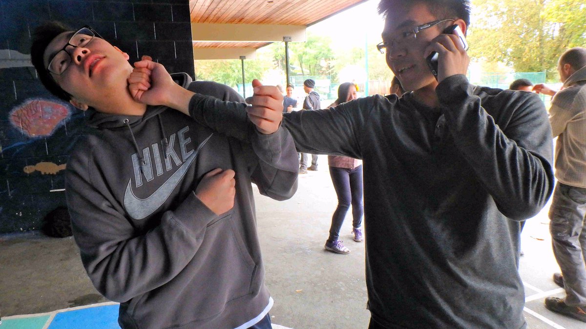 <a href="/DarrinChen94/">Darrin Chen</a>; multi-tasking or demonstrating ultra-cool Kung Fu?
Fun photo from the Thanksgiving open-air class at Wing Tsun Vancouver.