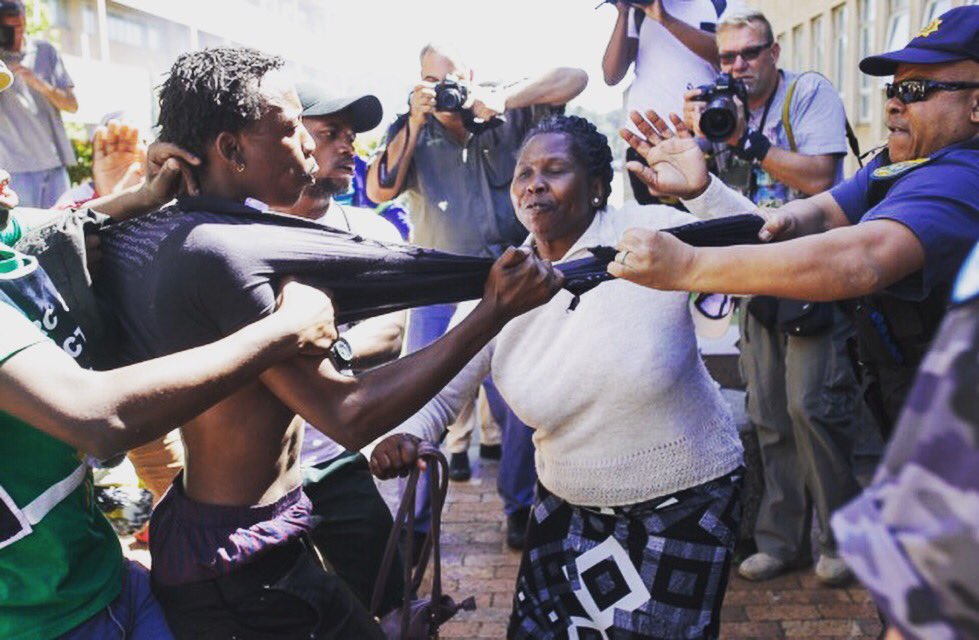 Dr_Ntentema's tweet photo. We fear not, the system z brutal but we are not giving in, Black resistance. Our parents are fighting along us.
#FeesMustFall 
#UCTshutdown https://t.co/E4Rd2GMOcl