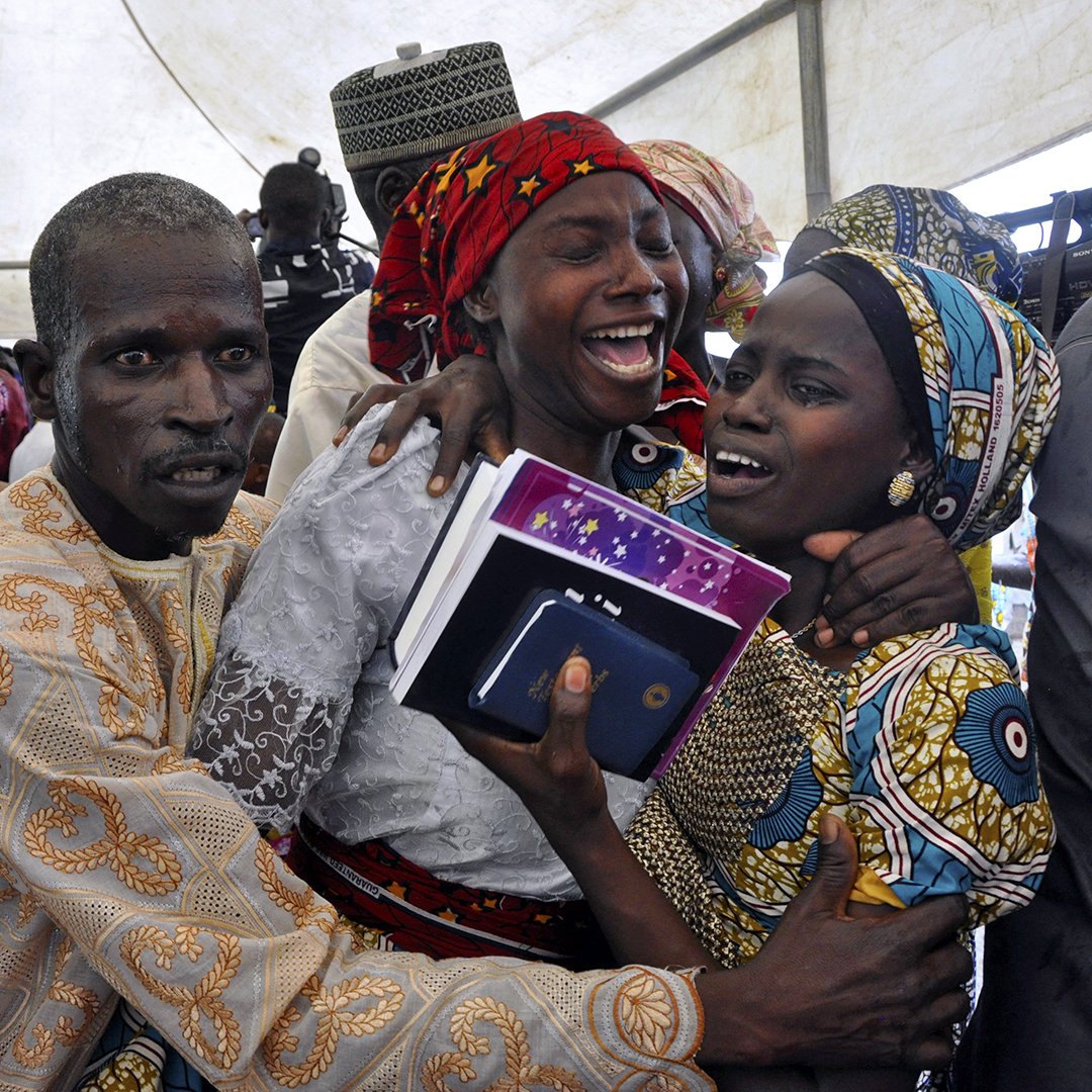 One of the kidnapped Chibok girls celebrates her release with family members in Abuja, Nigeria on October 16th 2016 (AP)