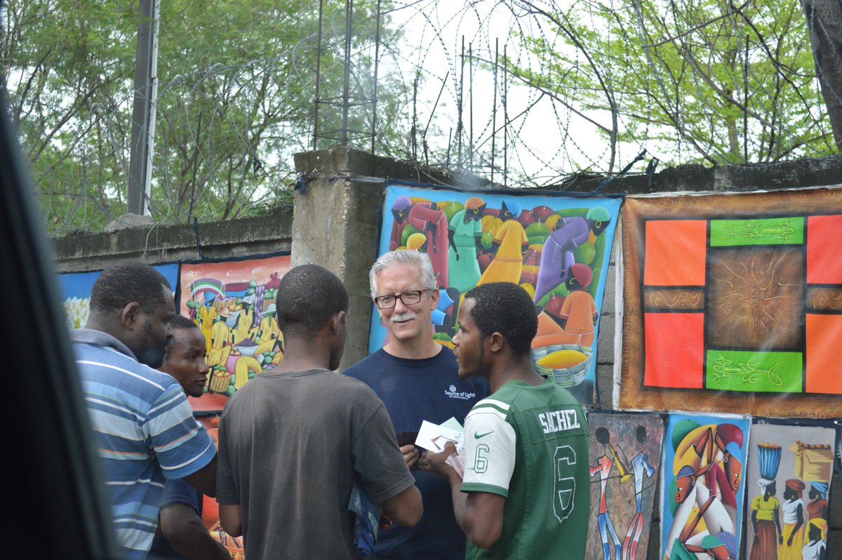 slmin's tweet photo. Phillip Frasier making a deal for some souvenirs from Haiti last week! https://t.co/EJCkii6Rg9