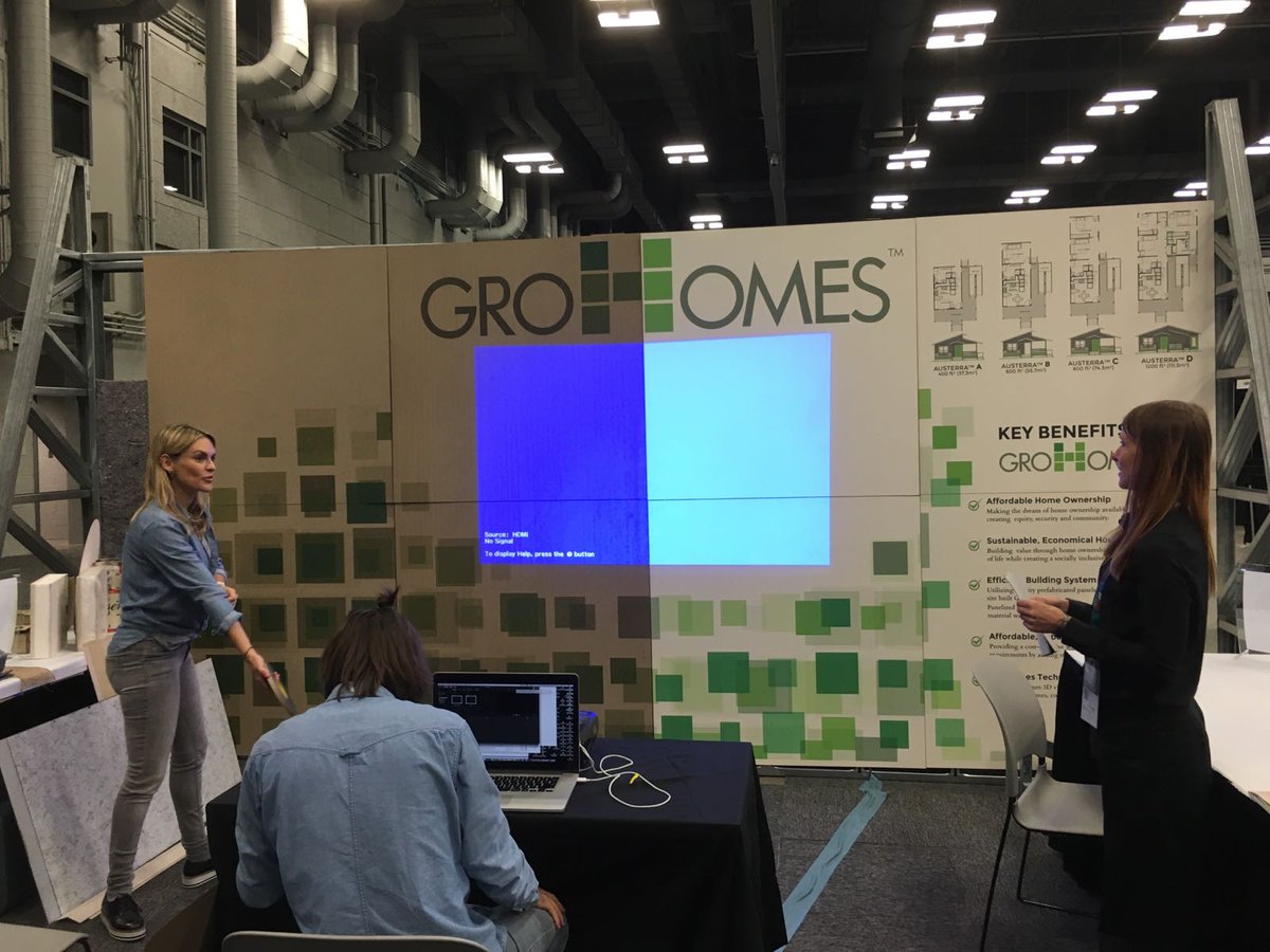 GroHomes's tweet photo. A few minutes before opening the doors, we had some last-minute hiccups with the projector... but now it's all good and ready! #SXSWEco https://t.co/QtgbHFWVwi