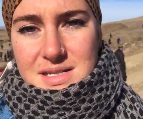 UR_Ninja's tweet photo. BREAKING: @shailenewoodley has been arrested for trespassing during #NoDAPL action, by heavily-armed Sheriffs in North Dakota. https://t.co/O5F9yKLhTA