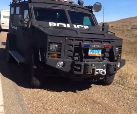 UR_Ninja's tweet photo. BREAKING: @shailenewoodley has been arrested for trespassing during #NoDAPL action, by heavily-armed Sheriffs in North Dakota. https://t.co/O5F9yKLhTA