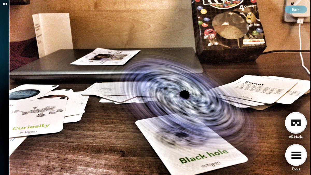 DrGaryKerr's tweet photo. Also in my hotel room are black holes, the solar system, comets &amp; Mars curiosity! #AugmentedReality #AR #Space4D @ideasfoundation 🚀👌 https://t.co/QlYgGs7v5G