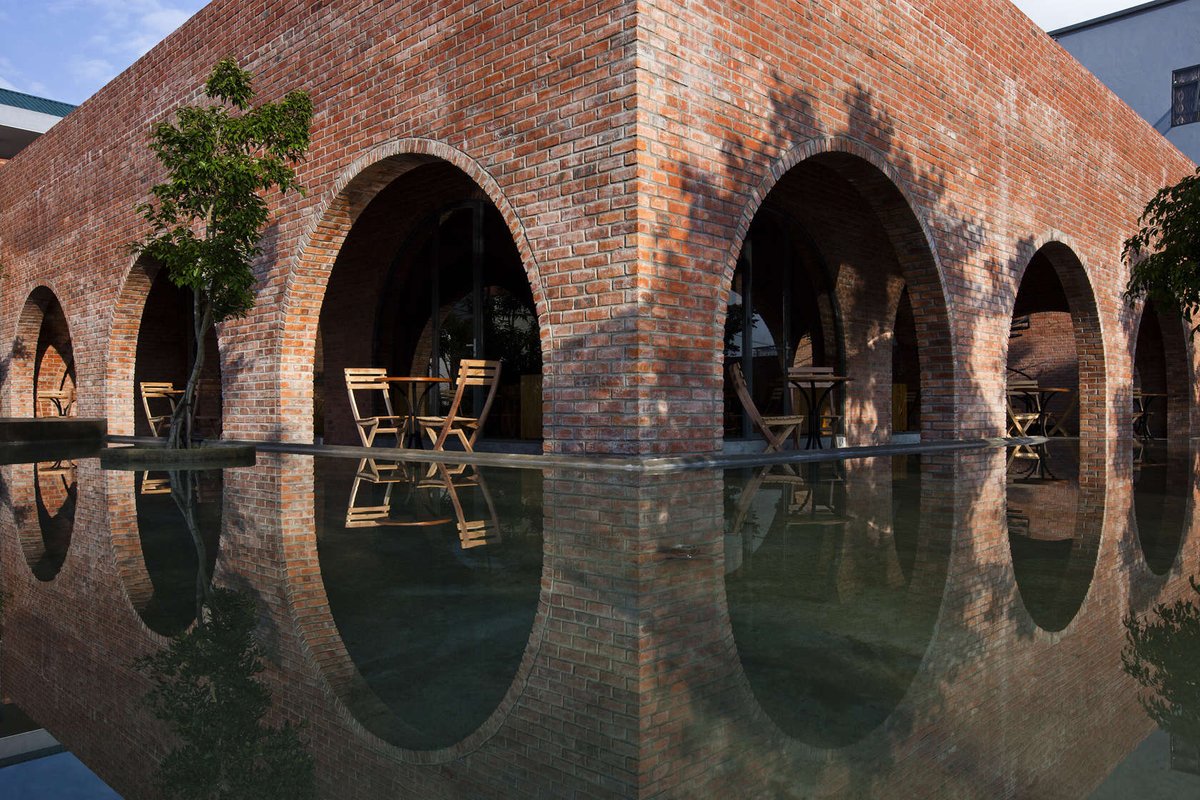 Architizer's tweet photo. Brick, concrete, stone, trees and water are essential design elements in F-coffee, our #ProjectOfTheDay https://t.co/HQKnCgCgTC https://t.co/ijRkjQM06s