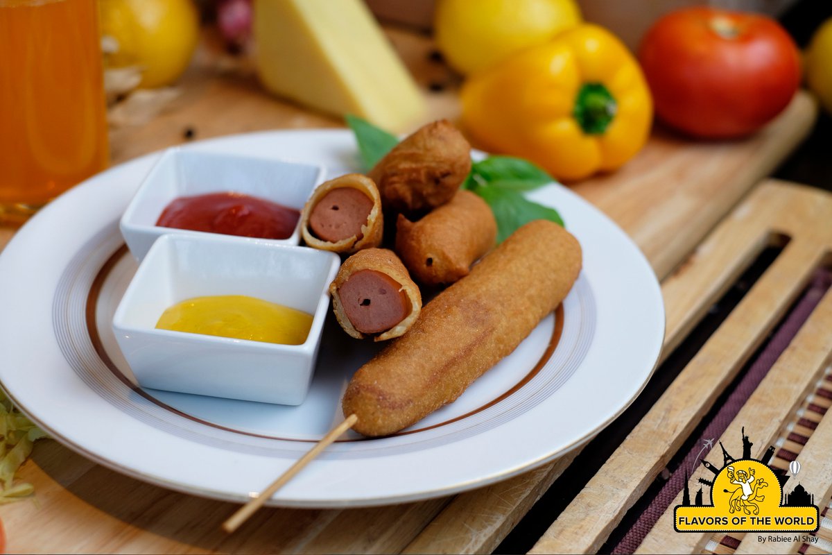 flavorsworlduae's tweet photo. Chicken frank from the inside and cornmeal batter from the outside, choose your dipping and enjoy your #corndog. #flavorsoftheworld https://t.co/6FMRd6dnW5