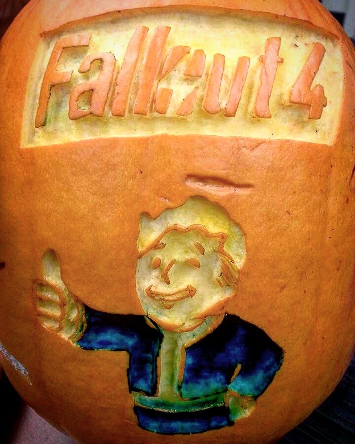 Joan_of_Shark's tweet photo. @bethesda @Fallout I did this last year but forgot to tweet it. Maybe you'll enjoy this as much as I did carving it! 4 sides to 1 pumpkin. https://t.co/6zGSSEY5NH