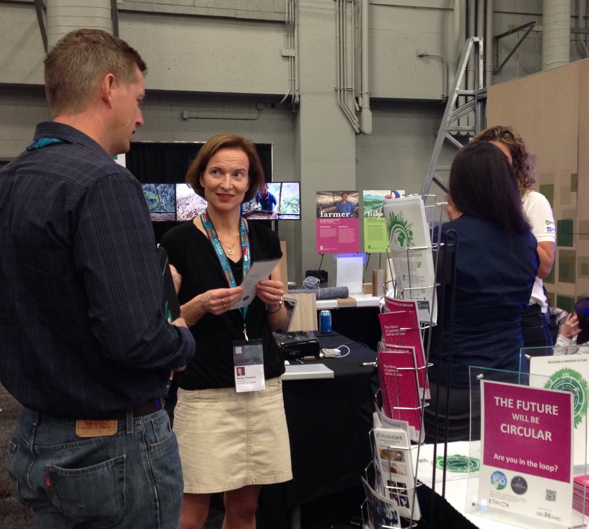 EthicaFinland's tweet photo. @FontellPaula telling about #circulareconomy to a #SXSWEco visitor. @GroHomes https://t.co/73i9RHrH9Q