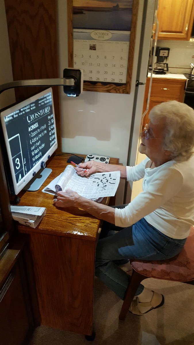 NanoPacInc's tweet photo. Our friend Ollie using her new video magnifier to work the crossword puzzle! #NanoPac #lowvision #maculardegeneration https://t.co/ETBea6oqtm
