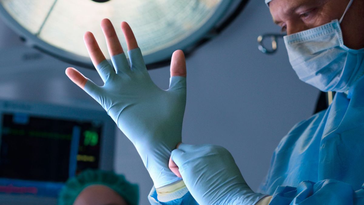 TheOnion's tweet photo. Badass Surgeon Puts On Fingerless Latex Gloves Before Operating https://t.co/CK7JdkXmnn https://t.co/eA3JMmVUTh