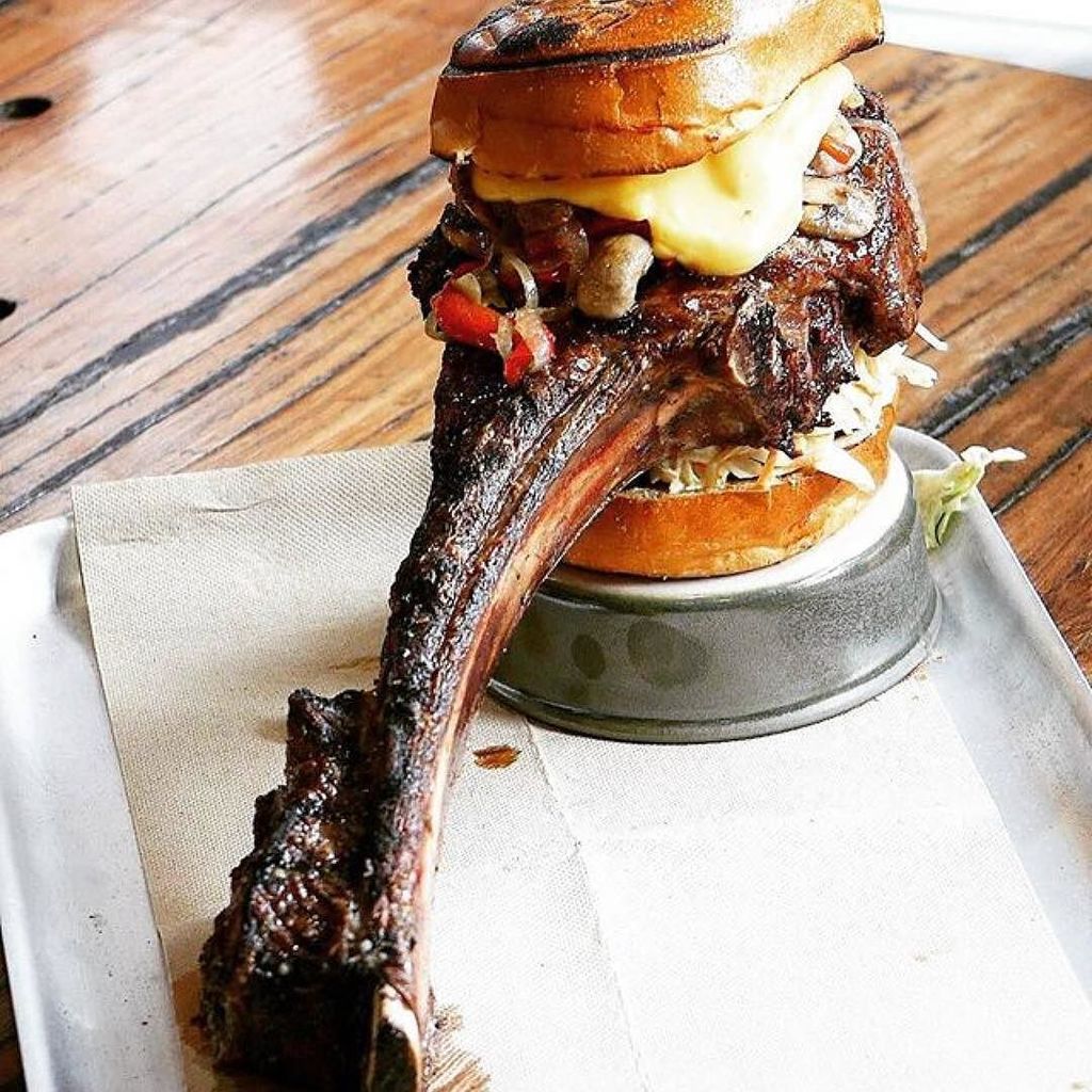 foodfirefeasts's tweet photo. How would tackle this to eat? Creativeness from @jamjam_li -  Tomahawk Steak Burger // now this is the ultimate bur… https://t.co/jUCU7auuGF