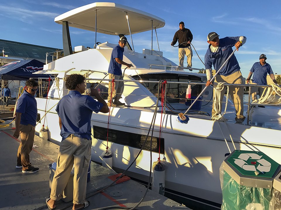 RWMaddenphotog's tweet photo. #AnnapBoatShows powerboat show.late prep. Opens tomorrow. I tweet a pic a day! Follow me! See more of my #iimages at https://t.co/7u9tQscKUl https://t.co/aYmDkrNWLP
