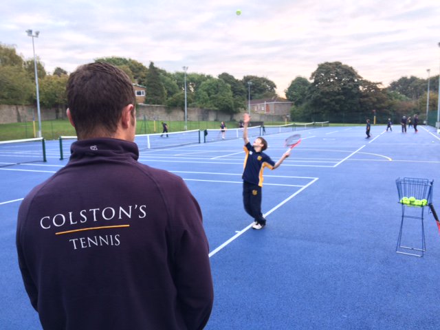 The new @colstonsschool tennis courts are busy early mornings these days with development sessions from 7.25am. Coach Pete looks on!