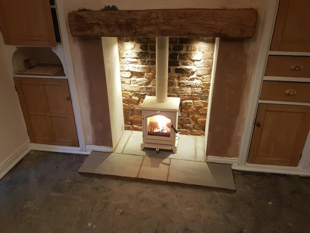 ESSE1854's tweet photo. @HotStuffStoves installed an ESSE 500 Vista wood burning stove. Colour reference Ash White. Enjoy #autumn https://t.co/nVyNgwWq9r