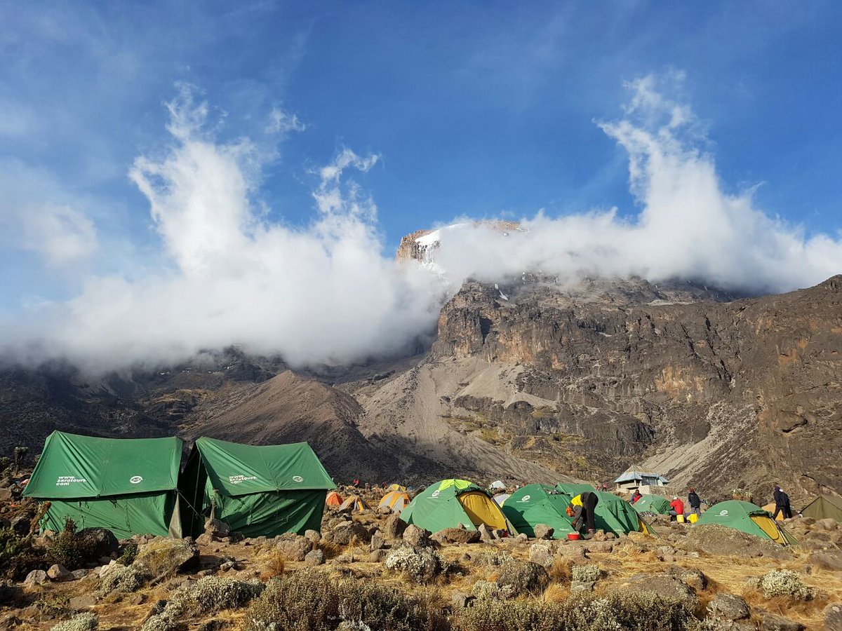 Joburg2Kili's tweet photo. We plan to summit on the 15th! What a view and phenomenal experience so far. Check where we are: https://t.co/xoDhaEdNCs #Joburg2Kili https://t.co/3xI2XiZ59r