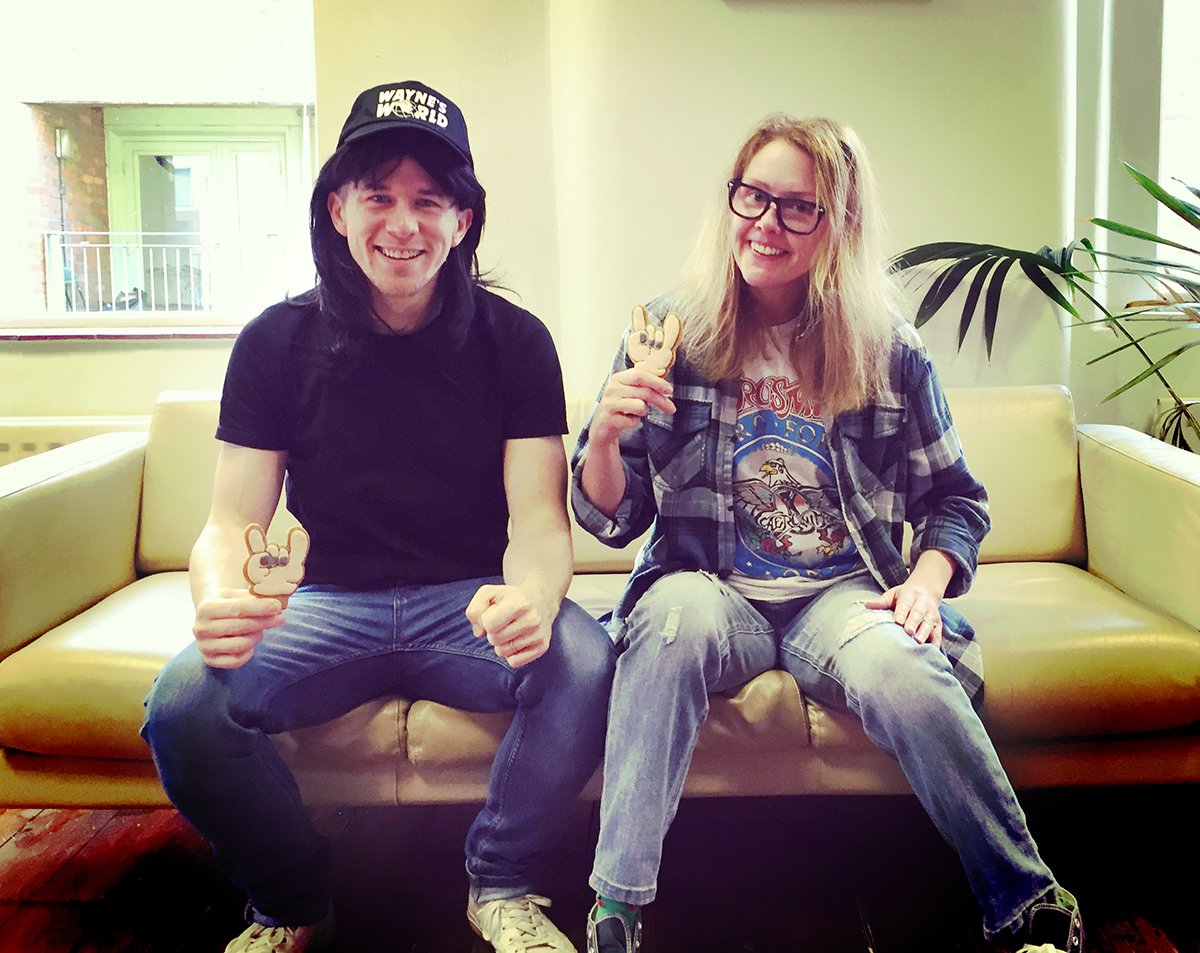 dinosaur_co_uk's tweet photo. @Caketober @4EVERManchester PARTY ON CAKETOBER! Wayne and Garth tuck into some ROCK biscuits on the Dino sofa #caketober https://t.co/r38abY9cXl