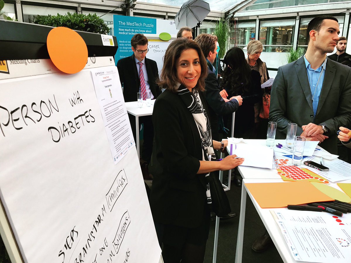 HCEconomist's tweet photo. #StandingMen installation @Europarl_EN, by @medtecheurope: Neha Dave is getting ready for #designthinking with @tadorna.π #StandwithMedTech https://t.co/dOK5q5gozu