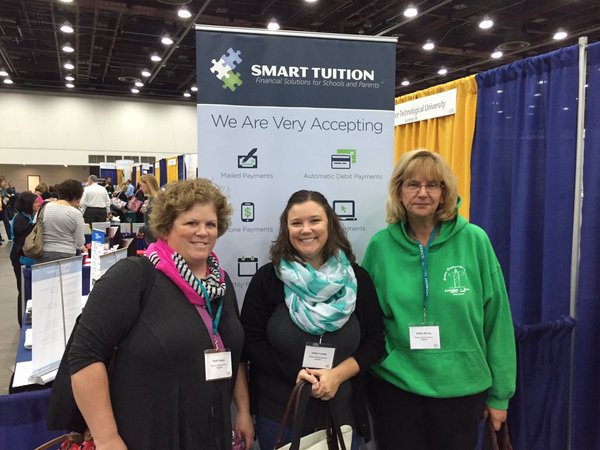SmartTuition's tweet image. Met Happy #SmartTuition clients from @Peace_Lutheran School at a recent conference. #LEA2016