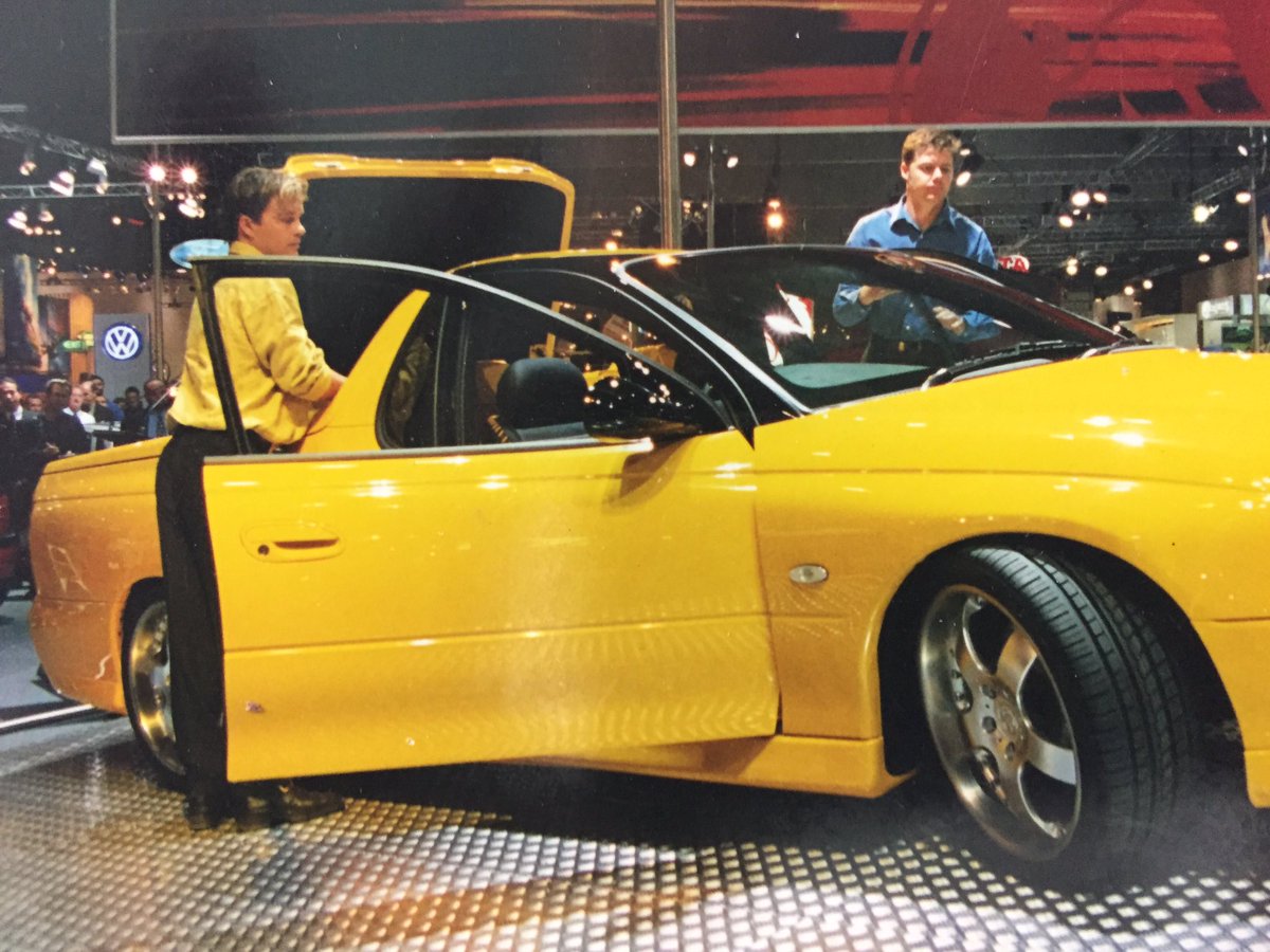 PeteHughes221's tweet photo. 2001 Melb motorshow . Launching the #Utester.Made sure hair and shirt matched the concept #olddays https://t.co/GUanhFQO6L