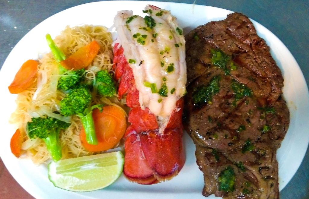 TheKitchenokc's tweet photo. 100% grass fed angus ribeye steak with lobster. #soyummy#sotender&amp;good https://t.co/B6gnu3X4FS