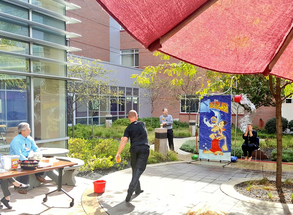 IUHealthECR's tweet photo. Just a little spouse douse! #invitedtoliveunited @IUHealthTeam #HighFiveFriday to everyone who paid to play today for the United Way! https://t.co/41rxYYF7C9