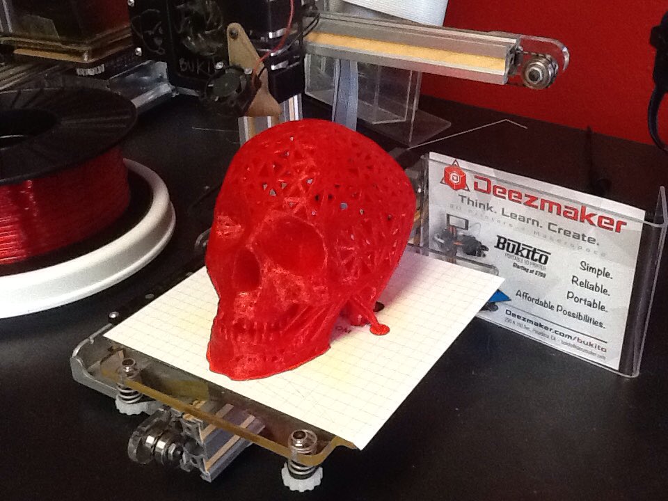 Deezmaker's tweet photo. Best and cutest portable #3dprinter #bukito by #deezmaker. Check out the print quality on this red skull head https://t.co/b3nTmMDYD9