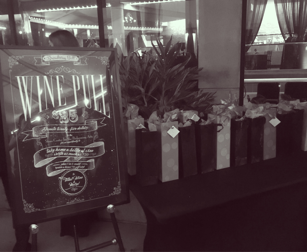 StrazCenter's tweet image. Donate $25 to take home a bottle of wine, and you could end up with one worth $50! #winepull #broadwayball #StrazAfterDark