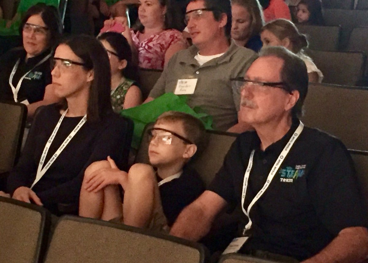 #CCPSSteam Papa, daughter (CCPS teacher), son/grandson enjoying the opening session wearing their safety glasses!