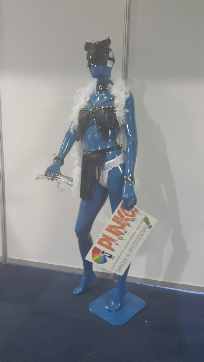 Punk28Studios's tweet photo. #teampunk28 Smurfette dressed by the team from Camilla-La custom leather - our neighbours at stand 115. Ready to meet @SEXPOSA visitors! https://t.co/zKEHvCN40f