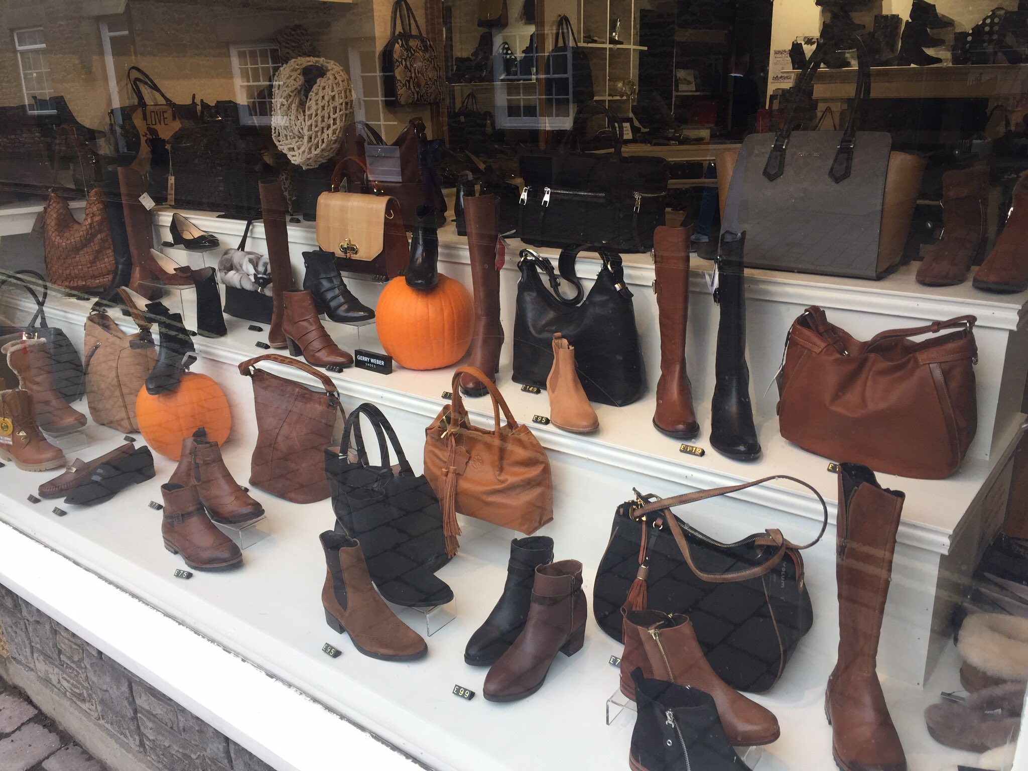 Finale Shoes on Twitter "got us some pumpkins and a spooky house! Hidden a bit by all the boots