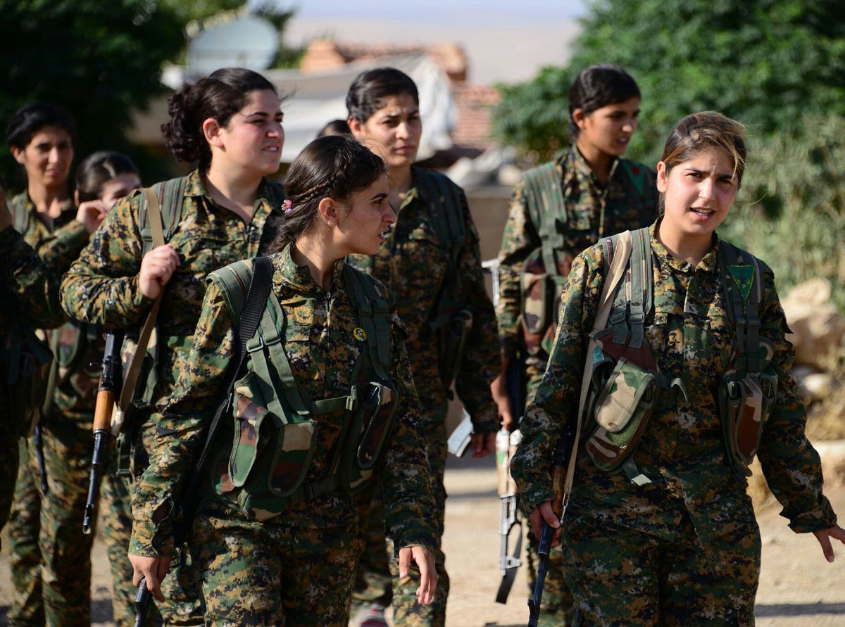 PlutoPress's tweet photo. 'No revolution can be successful if it lacks a female face' - the authors of Revolution in Rojava in @ROAR_Magazine https://t.co/9LkYSAg8Ov https://t.co/WwzSVMNn2t
