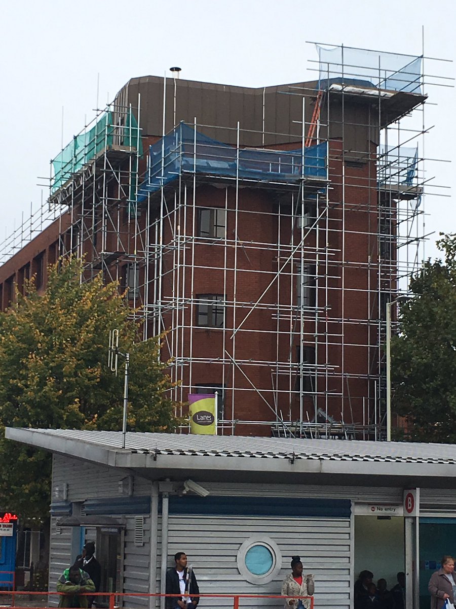 cslimited's tweet photo. New flats being built on top of existing edge protection erected all the way round and platforms for the removal of the zinc! https://t.co/qpcCeHWmQQ