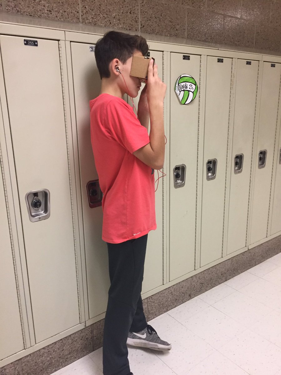 Students immersed VR viewing Zaatari Refugee Camp listening to #cloudsoversidra through the use of #googlecardboard