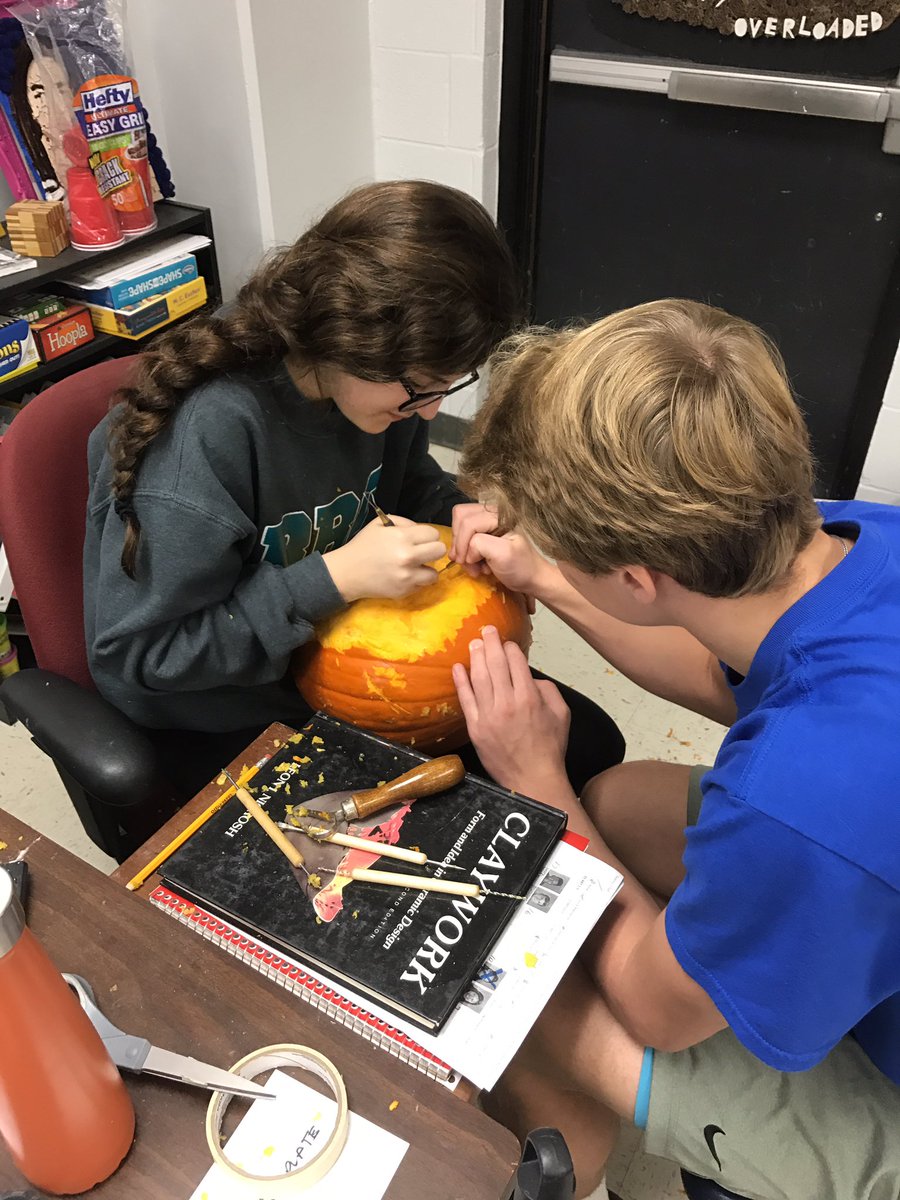 sheptonart's tweet photo. Pre-AP Sculpture Kids hacking away at this pumpkin. #tistheseason https://t.co/hbzHwFx7Pu