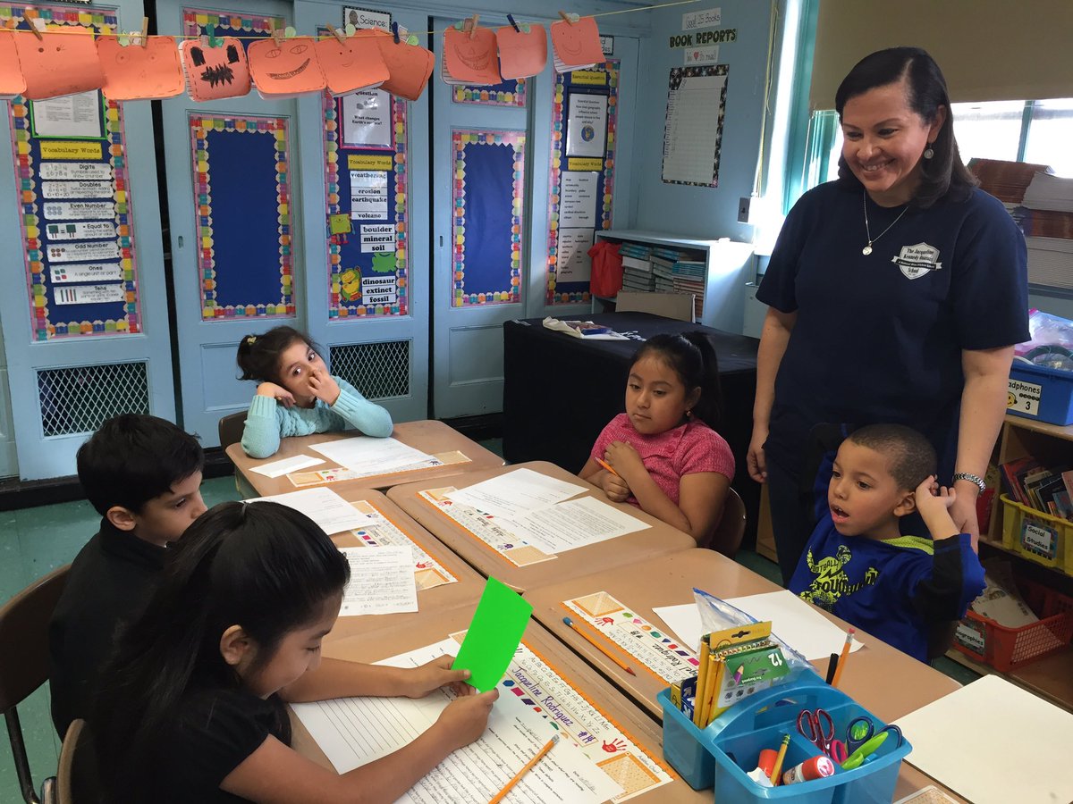 2ndGradeJKO's tweet image. #class202 works in #cooperativegroups to sequence the events in Strega Nona's Harvest. #smallgroups #grubsteinandfreda