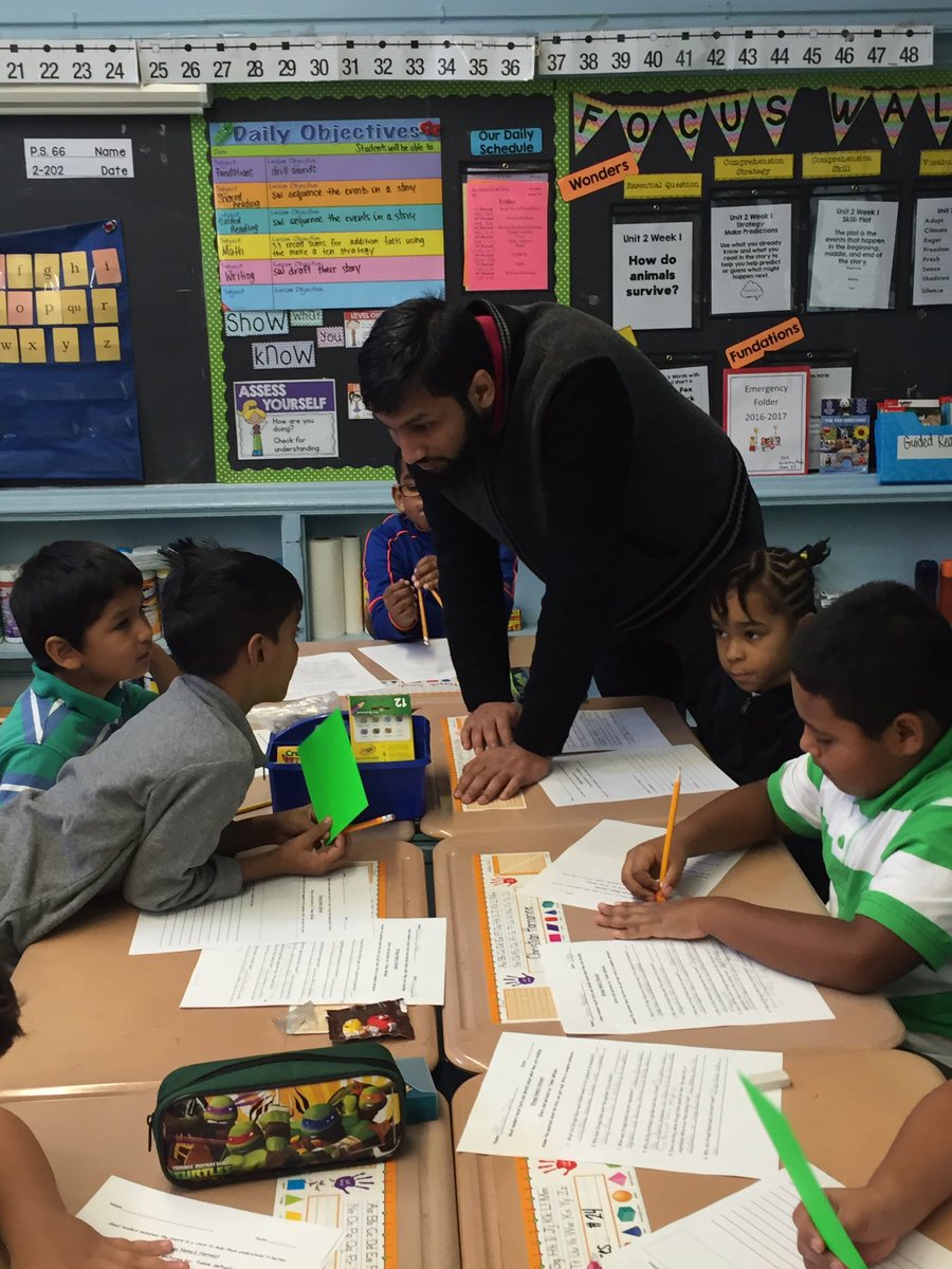 2ndGradeJKO's tweet image. #class202 works in #cooperativegroups to sequence the events in Strega Nona's Harvest. #smallgroups #grubsteinandfreda