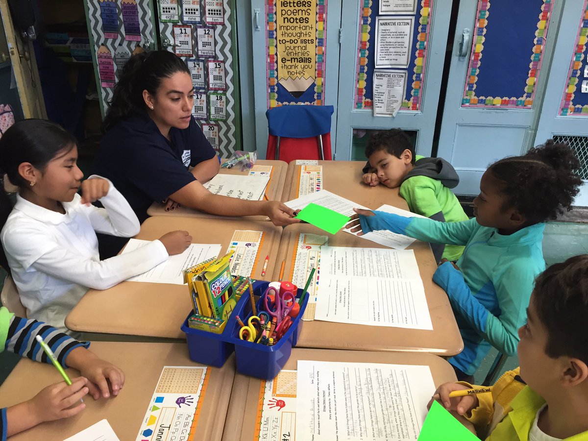 2ndGradeJKO's tweet image. #class202 works in #cooperativegroups to sequence the events in Strega Nona's Harvest. #smallgroups #grubsteinandfreda